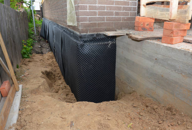 Happy homeowners after waterproofing job in Norristown